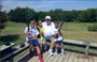 Papa teaching the grandkids to shoot